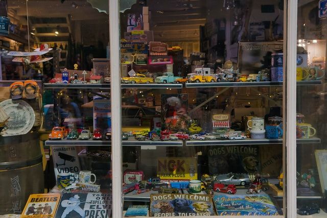 Toys on display on racks in a shop